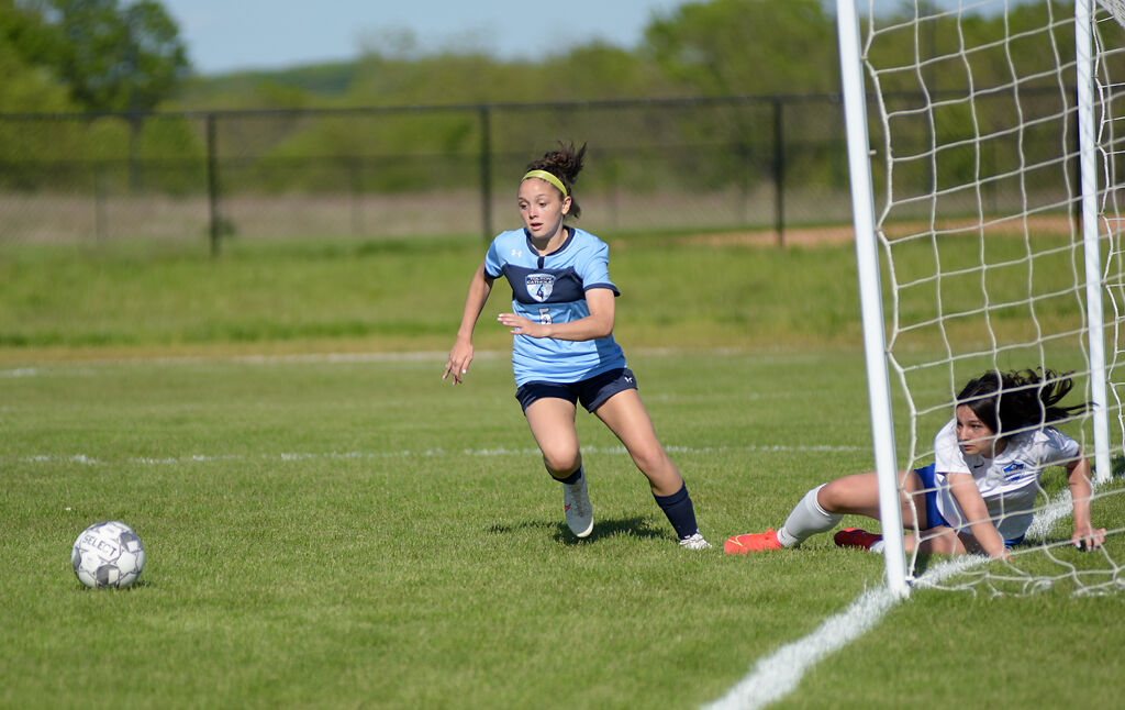 Rachel Broniec tries to make an additional shot